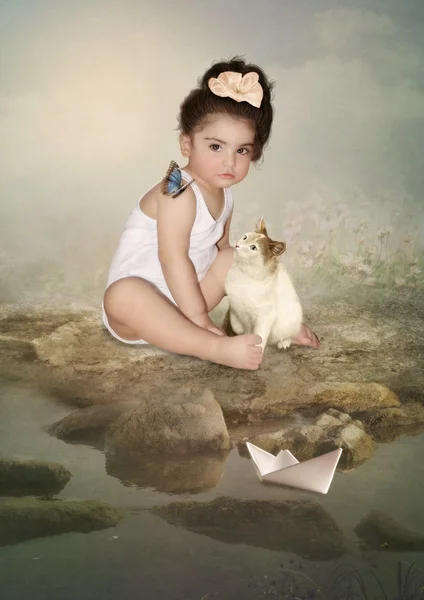 Girl with butterfly and kitten on river bank — Stock Photo, Image