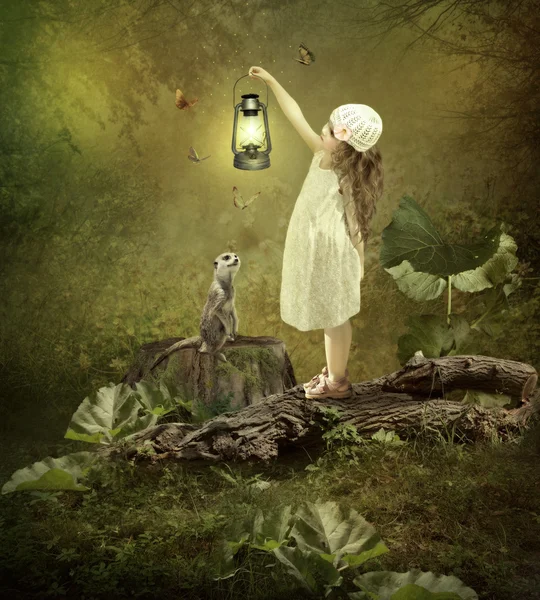 Petite fille avec lampe magique Photos De Stock Libres De Droits