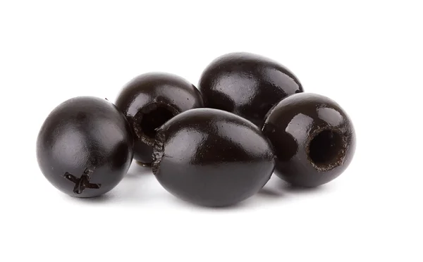Černé olivy na bílém v pozadí — Stock fotografie