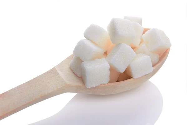 Sugar  cubes  on a white — Stock Photo, Image