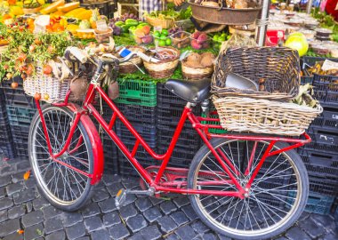 Fruit market with old bike in Campo di Fiori, Rome clipart