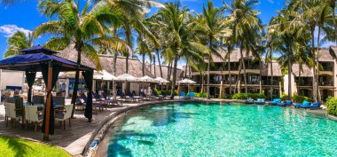 Tropik tatil. Constance Belle Mare Plage - Mauritius Adası 'ndaki lüks 5 yıldızlı otel. Ocak 2020