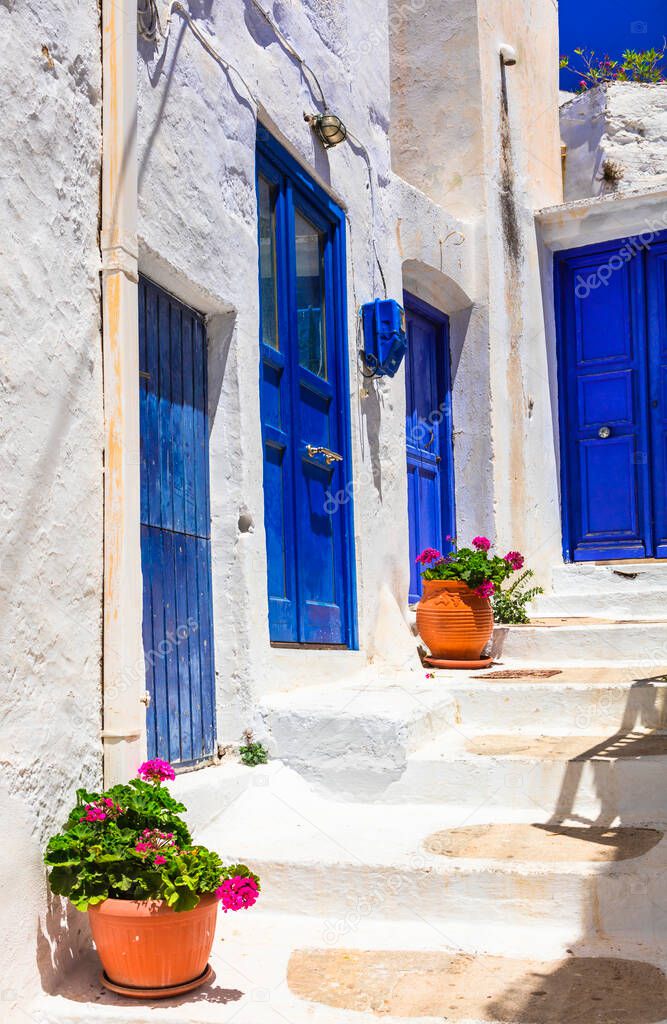 Old traditional white villages with colorful doors in Cyclades islands of Greece, Amorgos