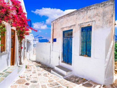 Greece, Cyclades. Beautiful Lefkes traditional greek village in Paros island. typical whitewashed houses and floral narrow streets. clipart