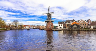Traditional Holland - vamals and windmills (Haarlem) clipart