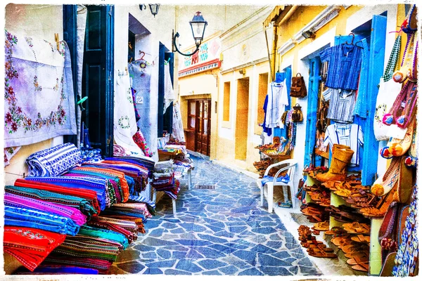 Traditional greek streets with  souvenirs - artistic picture — Stock Photo, Image
