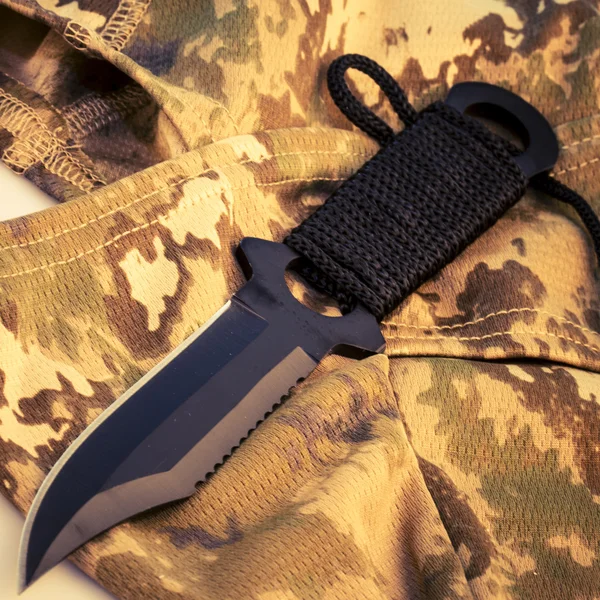 Uniform camouflage helmet and army knife — Stock Photo, Image
