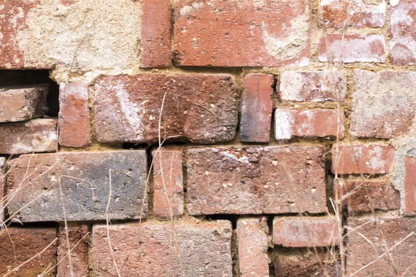 Oude rode bakstenen muur — Stockfoto