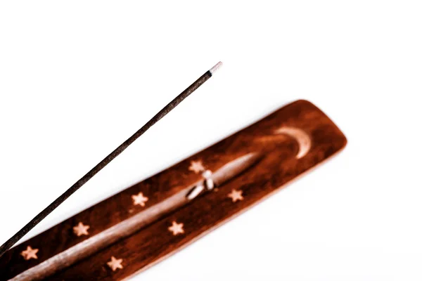 Incense stick on a wooden support on a white background — Stock Photo, Image