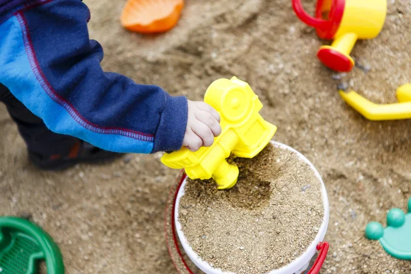 Barnleksaker på sand eller beach — Stockfoto