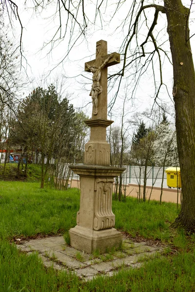 Old cross with jesus christ from stone — Stock Photo, Image