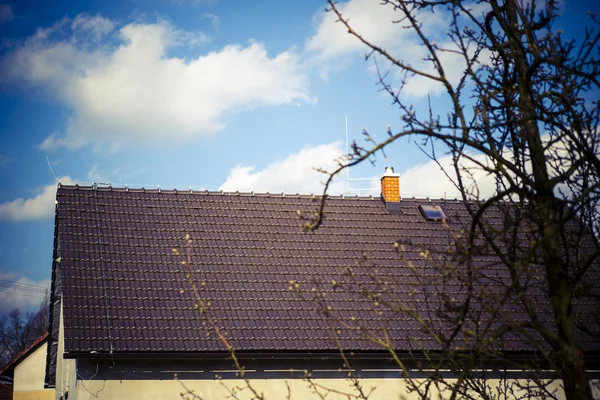 Brown roof with chimney and Lightning conductor — Stock Photo, Image