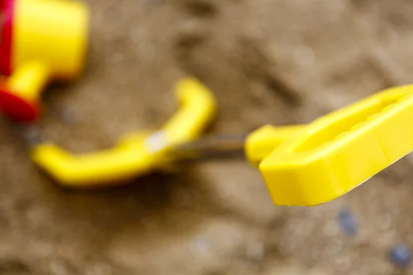 Barnleksaker på sand eller beach — Stockfoto