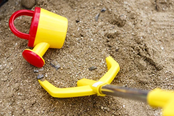 Children toys on sand or beach — Stock Photo, Image