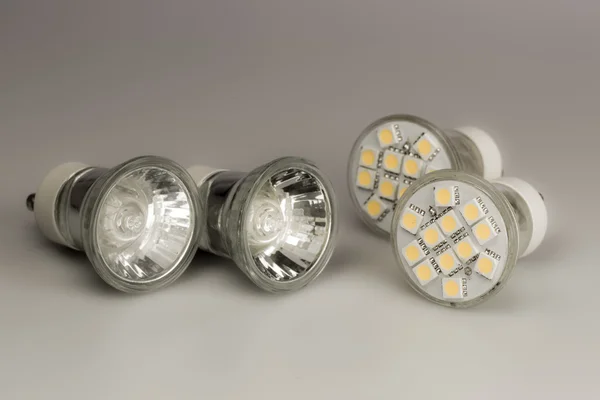 Modern LED bulbs with classic old bulbs — Stock Photo, Image