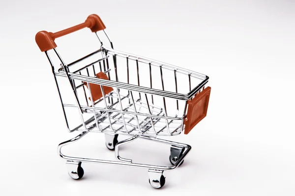 Shopping cart on white background — Stock Photo, Image