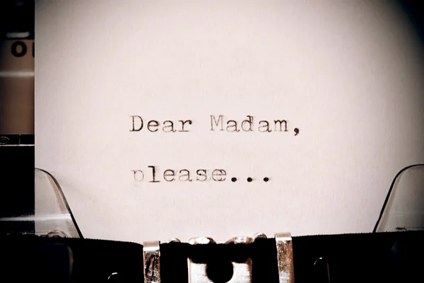 Text Dear madam typed on old typewriter — Stock Photo, Image