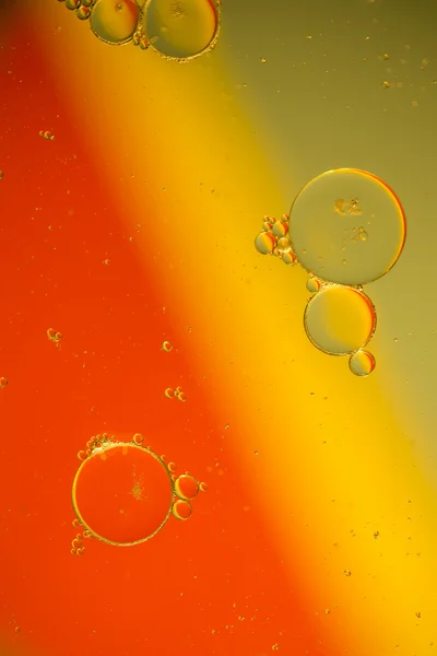 Oil drops on a water surface — Stock Photo, Image