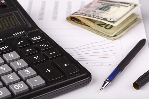 Business Charts with calculator, money and pen — Stock Photo, Image