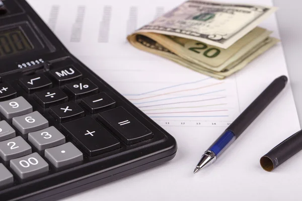 Business Charts with calculator, money and pen — Stock Photo, Image