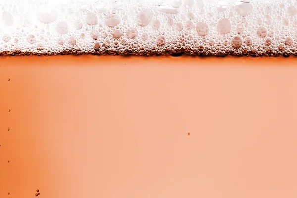 Beer with foam in the glass — Stock Photo, Image