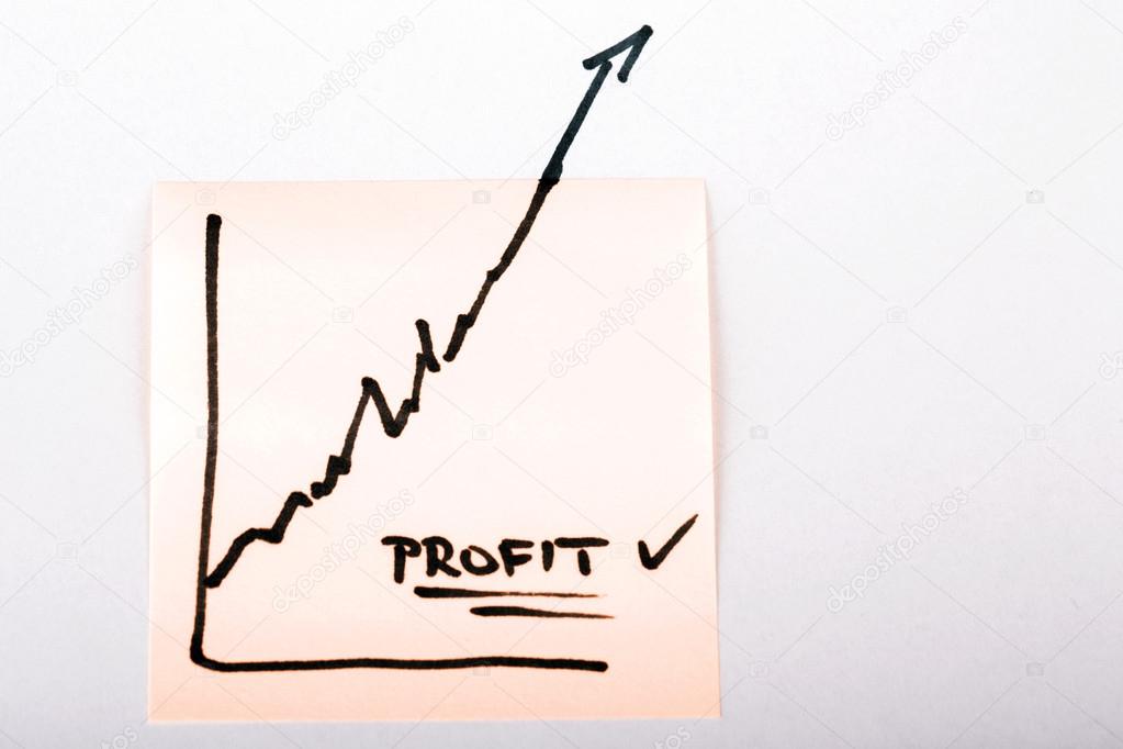 note paper with finance business graph going up - profit