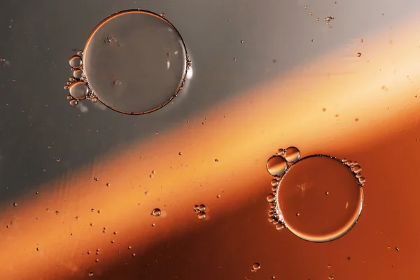 Oil drops on a water surface — Stock Photo, Image