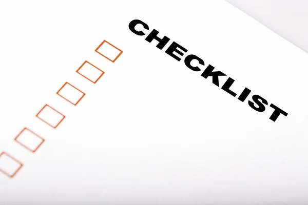 Checklista på vit — Stockfoto