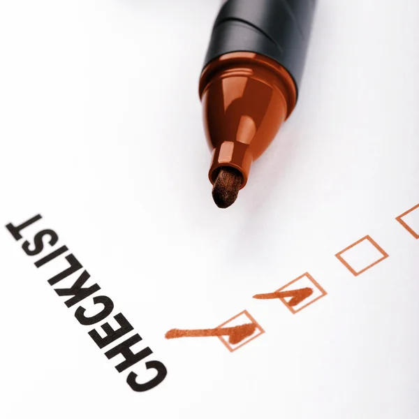 Checklist on white with marker — Stock Photo, Image