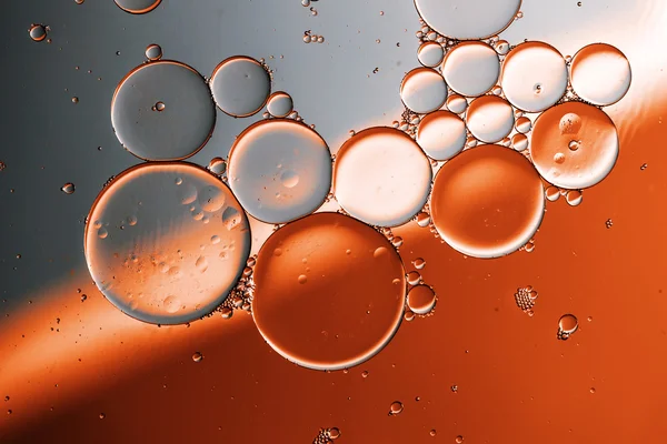 Oil drops on a water surface — Stock Photo, Image