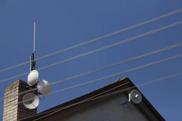 Wifi dish and antenna on the roof — Stock Photo, Image