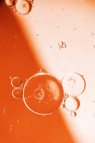 Oil drops on a water surface — Stock Photo, Image