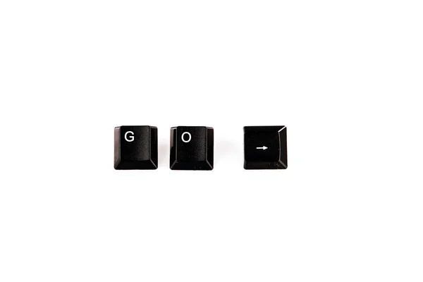 Go word written with black computer buttons over white — Stock Photo, Image