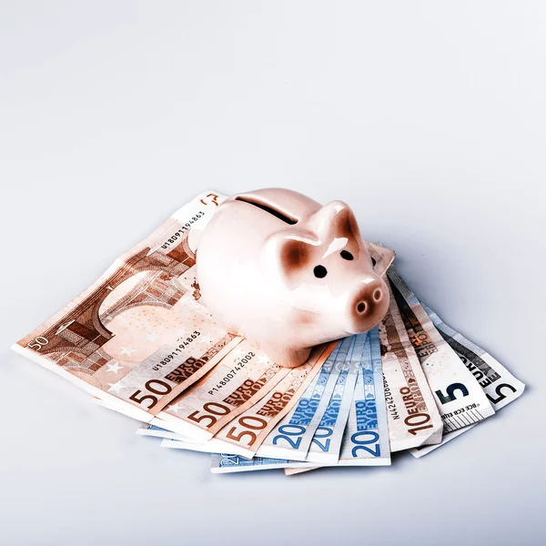 Pig bank on euro banknotes — Stock Photo, Image