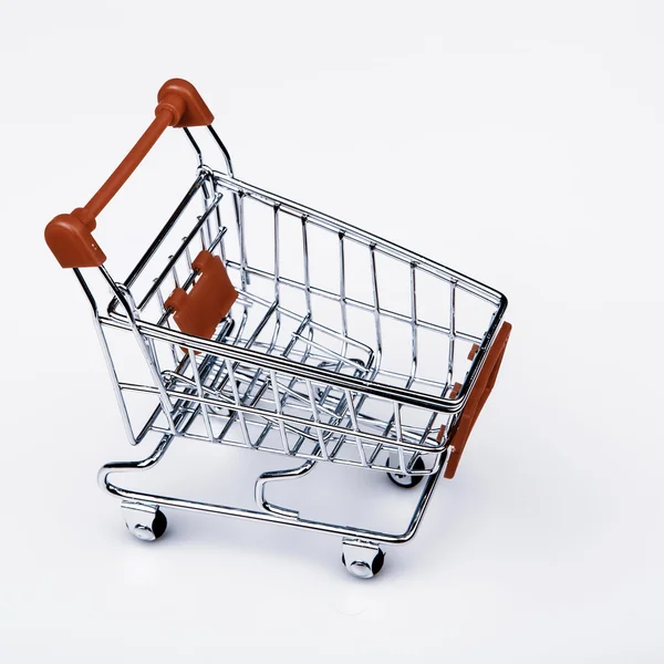 Shopping cart on white background — Stock Photo, Image