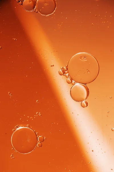 Oil drops on a water surface — Stock Photo, Image