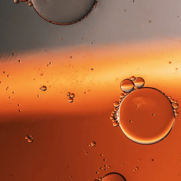 Oil drops on a water surface — Stock Photo, Image