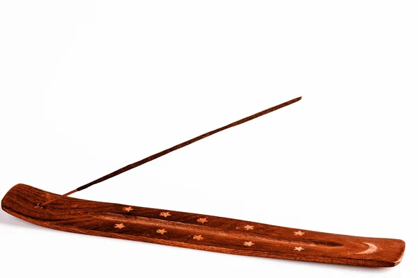 Incense stick on a wooden support on a white background — Stock Photo, Image