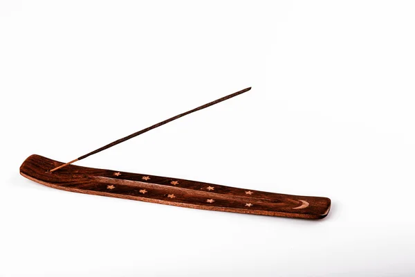 Incense stick on a wooden support on a white background — Stock Photo, Image