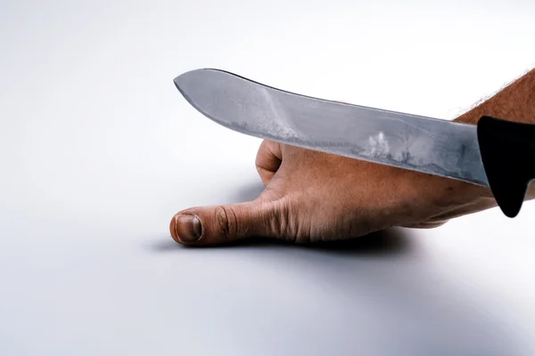 Close up of a suicidal man hand on isolated white background — Stock Photo, Image