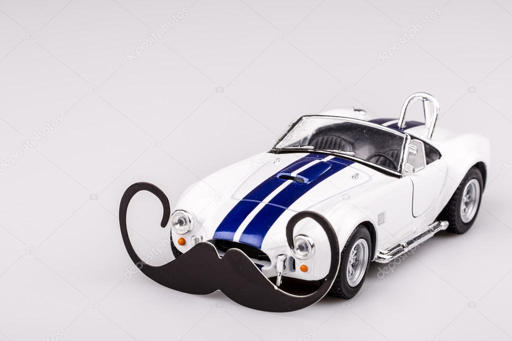 bautiful blue and white car, roadster with mustache