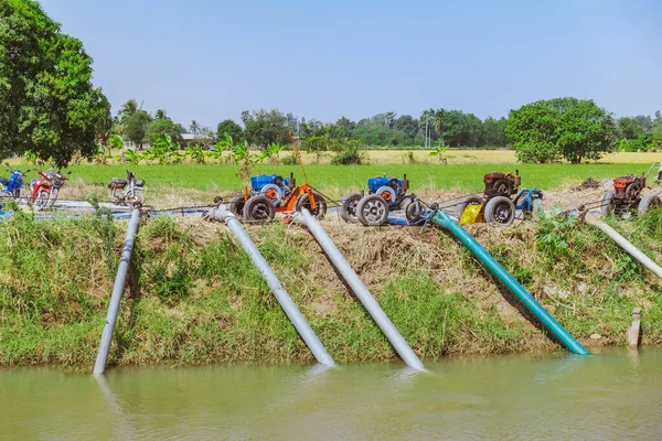 Row of water pump on trailer used to pump water from irrigation canal to enter agricultural areas