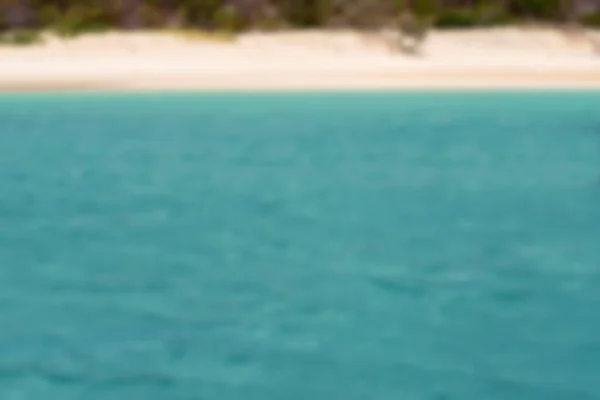 Suddig Bild Blått Vatten Havet Och Strand Suddig Bakgrund Semester — Stockfoto