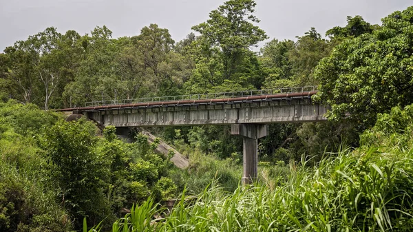 Concrete constructed bridge for highway traffic across a rural creek