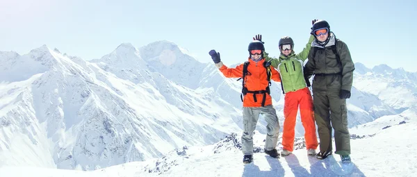 Snowboarders in the mountains — Stock Photo, Image