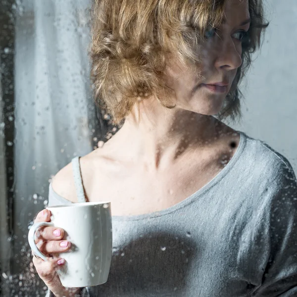 Portrait of Young woman with cup — Stock Photo, Image