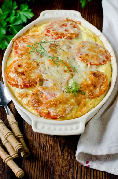 Casserole with rice, sea bass, tomato and cheese — Stock Photo, Image