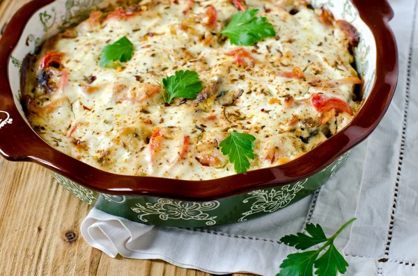 Carp baked with sour cream, pepper, bacon and onions — Stock Photo, Image