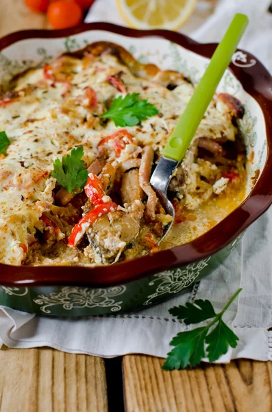 Carp baked with sour cream, pepper, bacon and onions — Stock Photo, Image