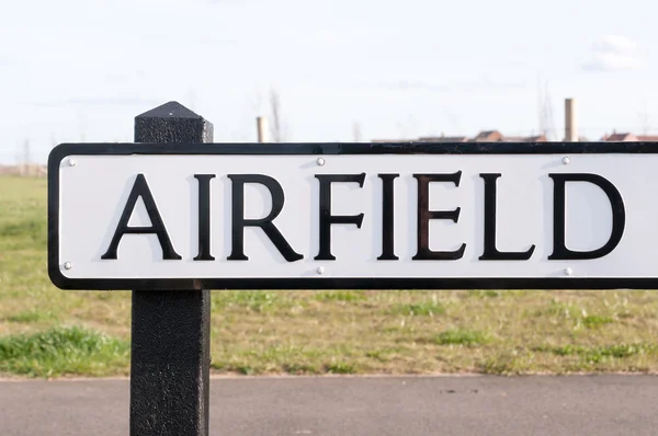 Airfield sign on a wooden post — Stock Photo, Image